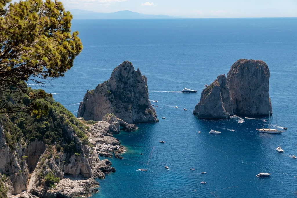 The Faraglioni rocks off the coast of Capri seen from the cliff path