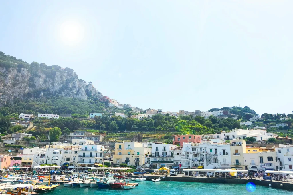 White and ochre houses on Capri seen from above the sea