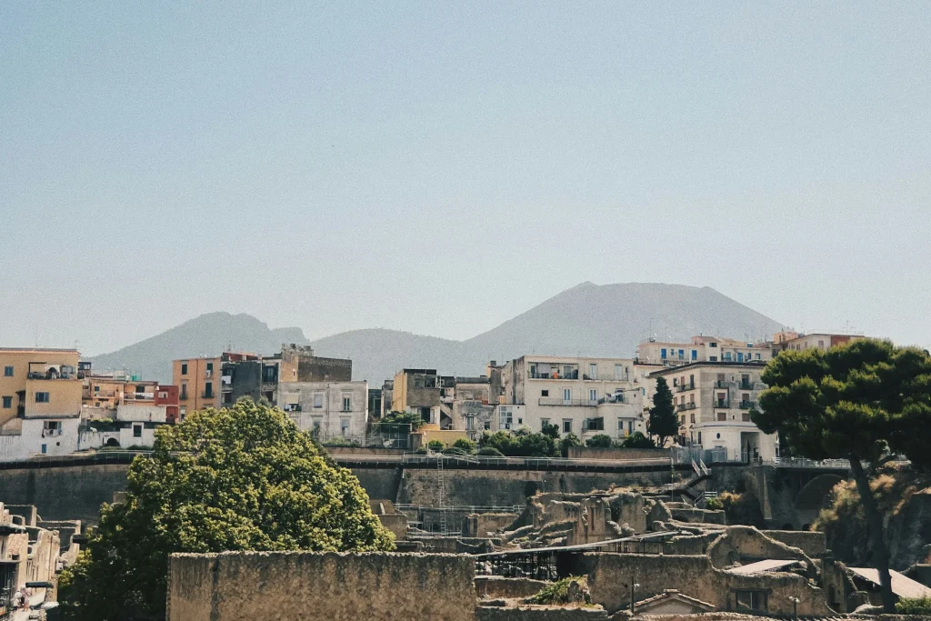 The town of Ercolano with Mount Vesuvius rising behind it