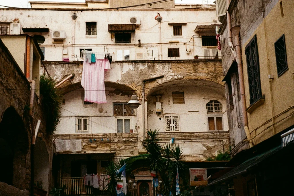Washing hanging between the buildings of a courtyard in the Naples old town