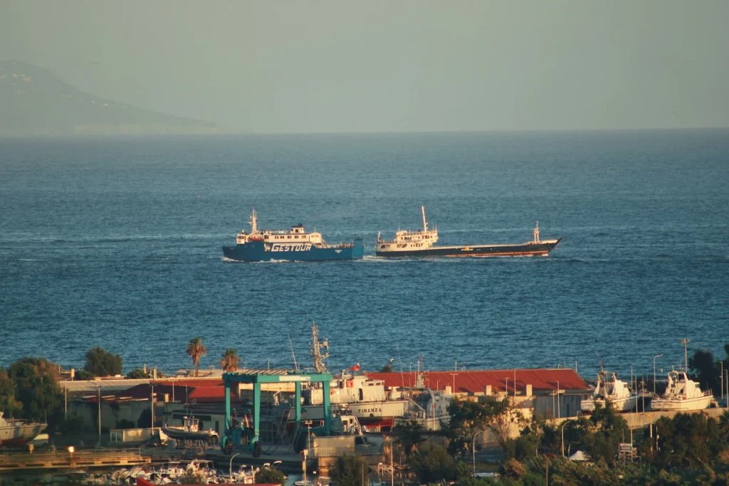 Two ships off the city of Naples seen from the water