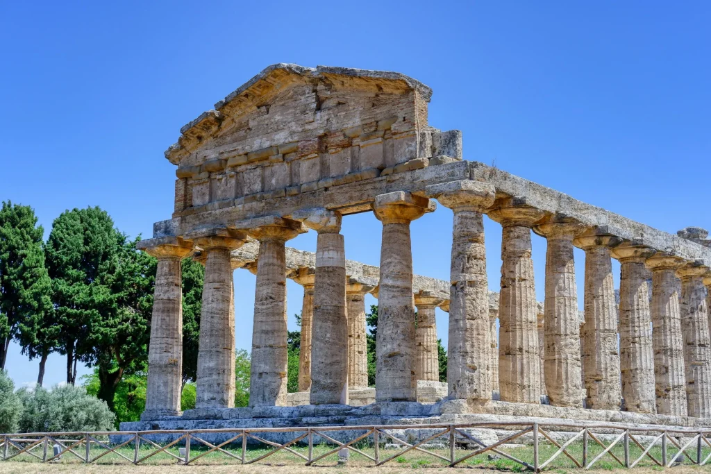 A Doric temple at Paestum standing under a blue sky