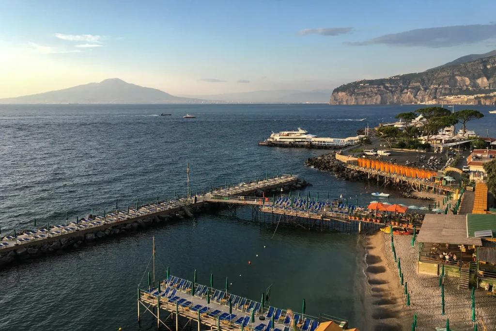 Marina Piccola in Sorrento at first light with Mount Vesuvius across the bay