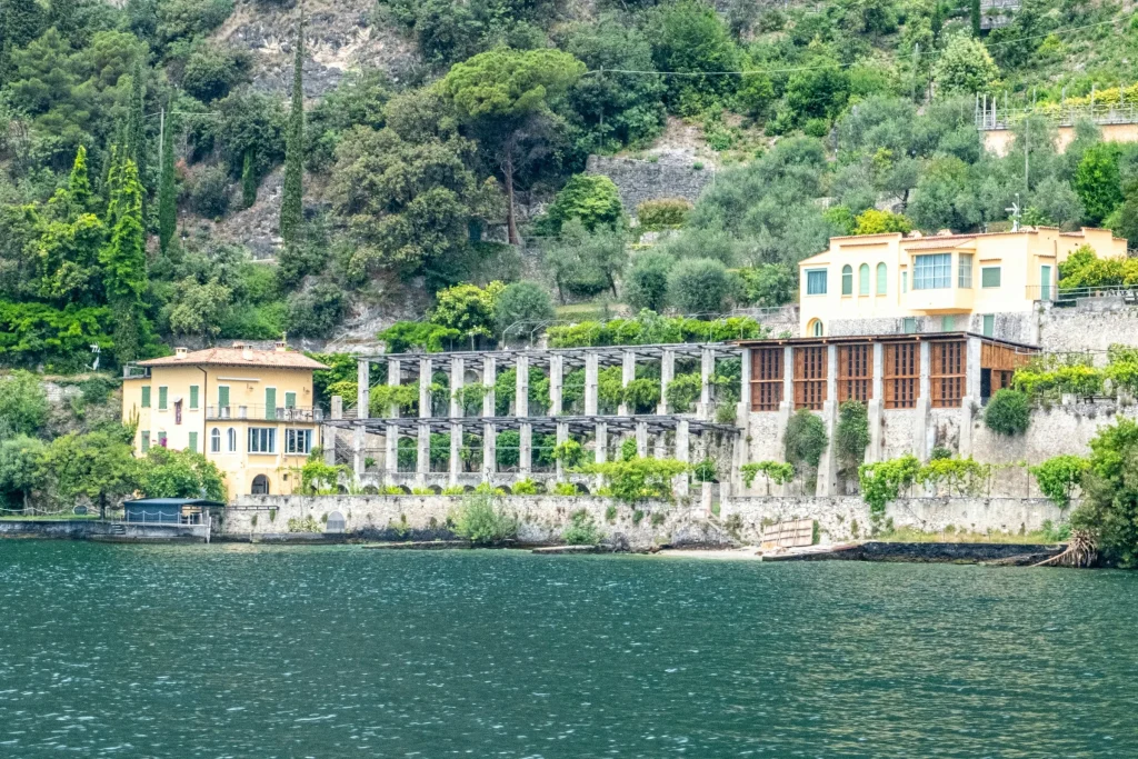 A historic villa and a long pergola on the hillside above the sea near Sorrento