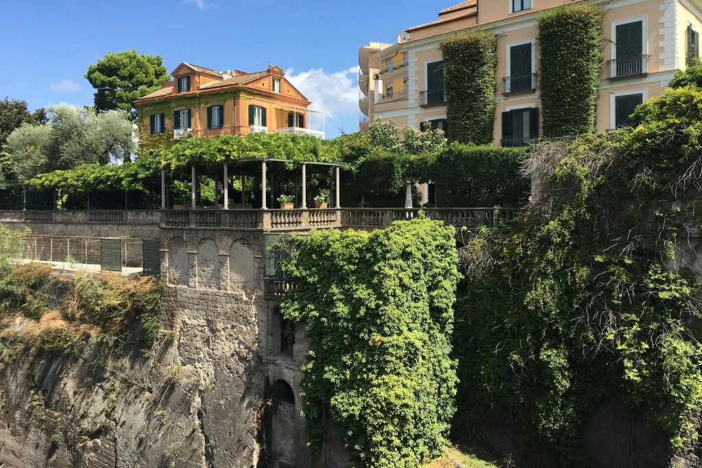 A villa and its garden on the hillside above the sea near Sorrento