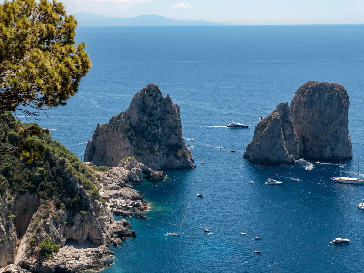 The Faraglioni rocks off the coast of Capri seen from the cliff path