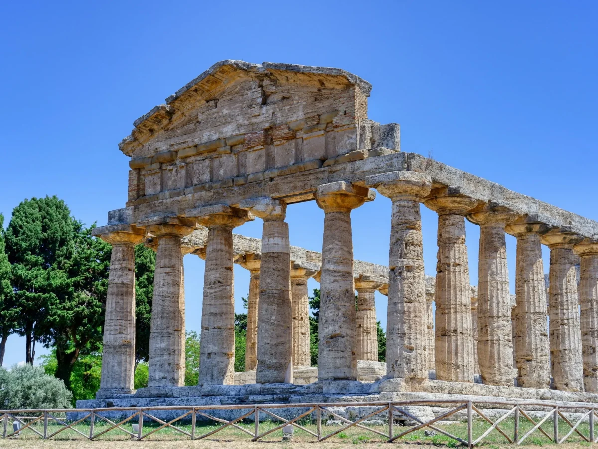 A Doric temple at Paestum standing under a blue sky